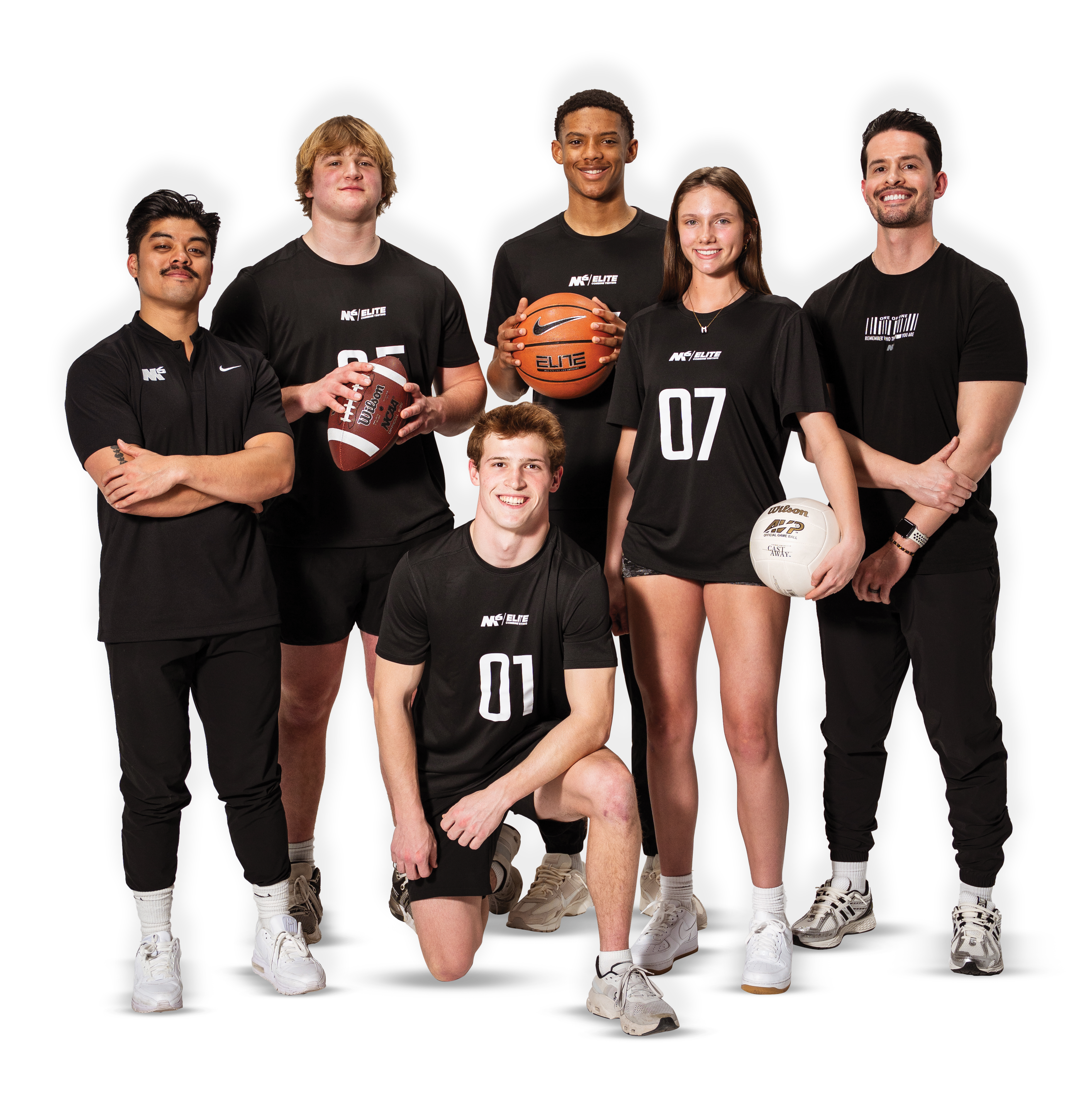 A group of six athletes posing together, each holding a different sports ball, wearing black athletic attire.