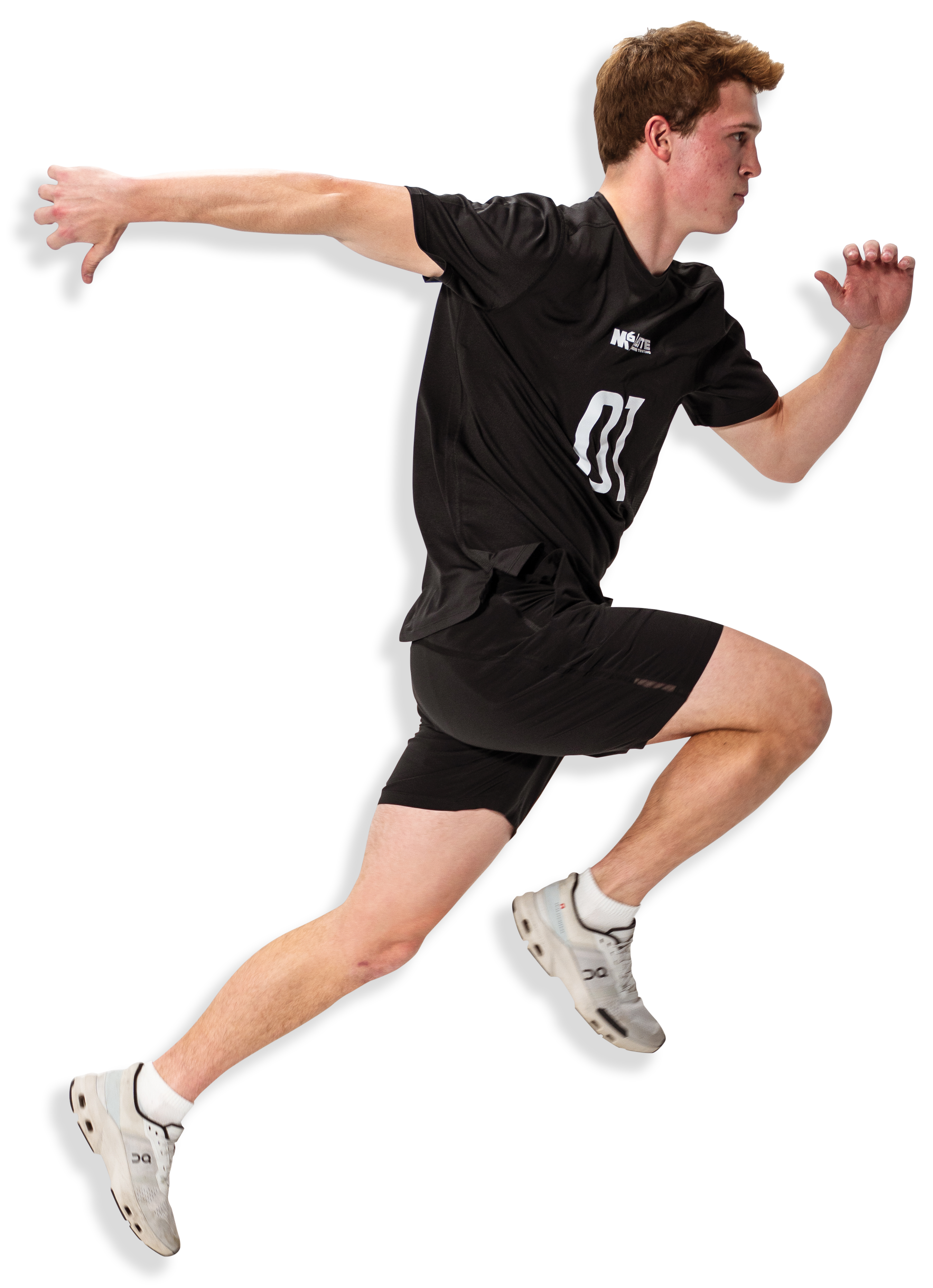 A young athlete in black sports attire is in a sprinting position, with arms extended and an intense expression on his face.